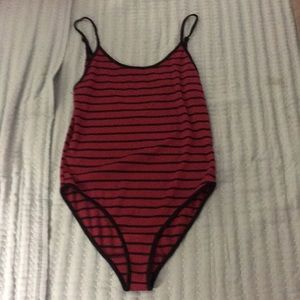 Maroon and black body suit